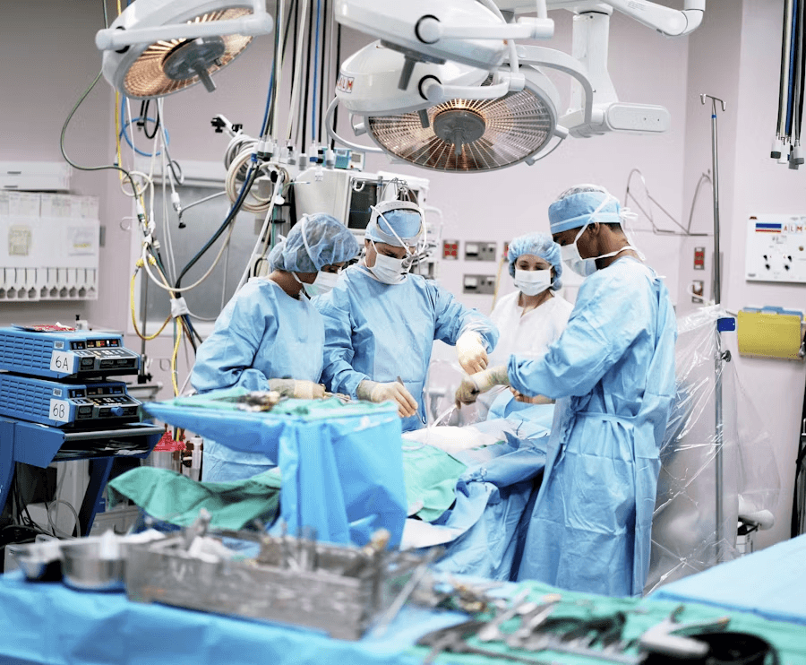 Surgeons operating in a theatre